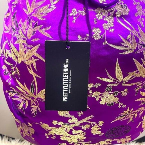 Purple mini dress with printed pattern and open crisscrossed back. - Picture 5 of 8